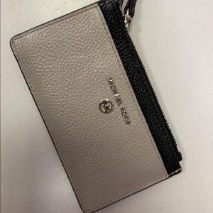 MK grey and black slim card holder! Has a spot or two of west but good condition